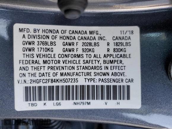 2019 Honda Civic Sport with VIN 2HGFC2F84KH507235, listed as a Copart auction lot 82616034 with 95,751 mi miles and Salvage title. Bid and sale history available at DreamBid. Image 14.