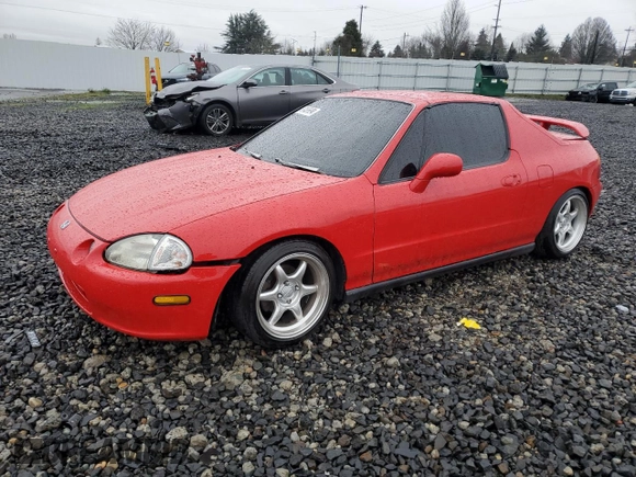 1993 Honda del Sol S with VIN JHMEG1143PS000418, listed as a Copart auction lot 87465694 with 156,826 mi miles and Salvage Title. Bid and sale history available at carsss.com. Image 1.