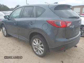 2013 Mazda CX-5 Grand Touring with VIN JM3KE4DE2D0164225, listed as a IAAI auction lot 41663412 with 162,738 mi miles. Bid and sale history available at carsss.com. Image 3.