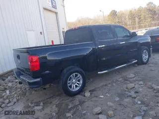 2014 Chevrolet Silverado 1500 LT with VIN 3GCPCREC0EG321309, listed as a IAAI auction lot 41411069 with 174,689 mi miles. Bid and sale history available at carsss.com. Image 4.