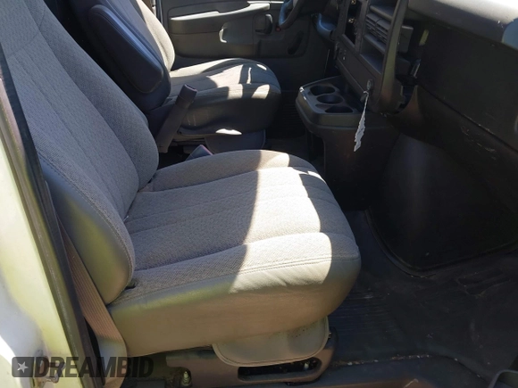 2014 Chevrolet Express Cargo Van with VIN 1GCWGFCA3E1130871, listed as a IAAI auction lot 42166083 with 279,624 mi miles. Bid and sale history available at carsss.com. Image 5.