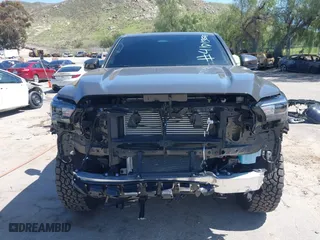 2024 Toyota Tacoma 4WD SR5 with VIN 3TMLB5JN4RM039036, listed as a IAAI auction lot 41813562 with 2,112 mi miles. Bid and sale history available at carsss.com. Image 13.
