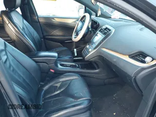 2015 Lincoln MKC with VIN 5LMTJ2AHXFUJ01440, listed as a IAAI auction lot 41526975 with 104,280 mi miles. Bid and sale history available at carsss.com. Image 5.