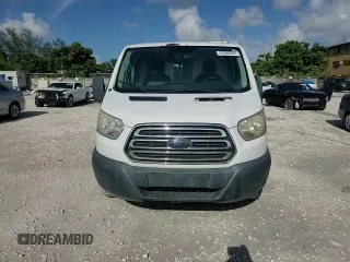 2015 Ford Transit Cargo with VIN 1FTNR1ZM8FKA33669, listed as a Copart auction lot 63588345 with 86,260 mi miles and Salvage title. Bid and sale history available at DreamBid. Image 14.