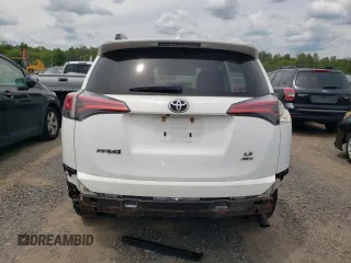 2017 Toyota RAV4 LE with VIN 2T3BFREV3HW607940, listed as a Copart auction lot 58330855 with 67,684 mi miles and Salvage title. Bid and sale history available at DreamBid. Image 6.