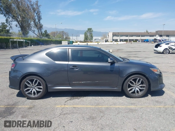 2015 Scion tC with VIN JTKJF5C74F3090309, listed as a IAAI auction lot 41988036 with 158,240 mi miles. Bid and sale history available at carsss.com. Image 13.
