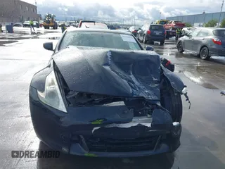 2012 Nissan 370Z Touring with VIN JN1AZ4EH4CM561303, listed as a IAAI auction lot 41788638 with 111,958 mi miles. Bid and sale history available at carsss.com. Image 12.