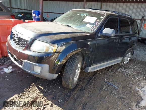 2011 Mazda Tribute Sport with VIN 4F2CY9C7XBKM06202, listed as a IAAI auction lot 41281197 with 195,443 mi miles and . Bid and sale history available at DreamBid. Image 2.