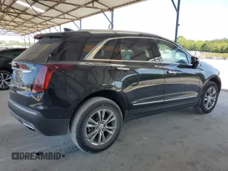 2021 Cadillac XT5 FWD Premium Luxury с VIN 1GYKNCRSXMZ155473, выставлен на аукционе Copart как лот 59883874 с пробегом 2 038 миль миль и Списание • Salvage title. История ставок и продаж доступна на DreamBid. Изображение 3.
