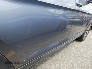 2024 Volkswagen Atlas SE z VIN 1V2HR2CAXRC564175, wystawiony jako IAAI lot #42785455 z przebiegiem 14 479 mil mil oraz . Historia ofert i sprzedaży dostępna na DreamBid. Obrazek 7.