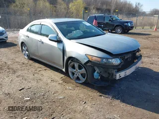 2009 Acura TSX z VIN JH4CU26629C009995, wystawiony jako IAAI lot #42011435 z przebiegiem 104 959 mil mil oraz . Historia ofert i sprzedaży dostępna na DreamBid. Obrazek 1.