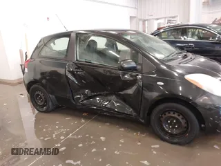 2011 Toyota Yaris with VIN JTDJT4K3XB5327229, listed as a IAAI auction lot 41275717 with 140,276 mi miles. Bid and sale history available at carsss.com. Image 6.