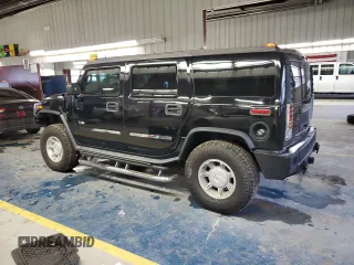 2003 Hummer H2 with VIN 5GRGN23U73H116472, listed as a Copart auction lot 86919214 with 172,543 mi miles and Salvage Title. Bid and sale history available at carsss.com. Image 2.