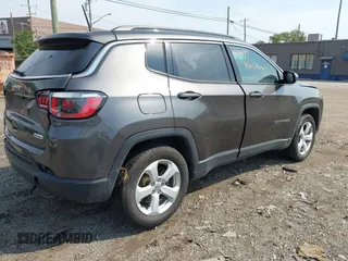 2017 Jeep Compass Latitude with VIN 3C4NJDBBXHT666385, listed as a IAAI auction lot 40236415 with 110,643 mi miles and . Bid and sale history available at carsss.com. Image 4.