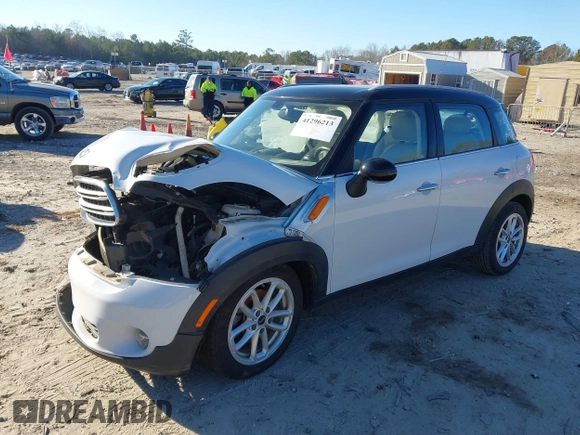 2015 MINI Countryman z VIN WMWZB3C53FWR43884, wystawiony jako IAAI lot #41296213 z przebiegiem 111 934 mil mil oraz . Historia ofert i sprzedaży dostępna na DreamBid. Obrazek 18.