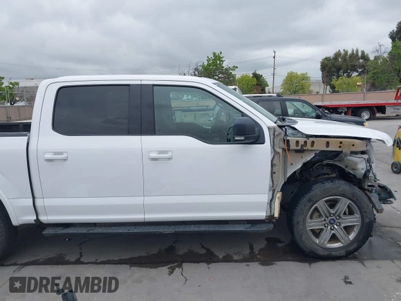 2018 Ford F-150 XL with VIN 1FTEW1EP0JKD97635, listed as a IAAI auction lot 42061289 with 108,495 mi miles. Bid and sale history available at carsss.com. Image 14.