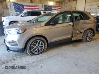 2021 Ford Edge SE z VIN 2FMPK4G96MBA23884, wystawiony jako Copart lot #45997735 z przebiegiem 129 558 mil mil oraz Szkoda całkowita • Salvage title. Historia ofert i sprzedaży dostępna na DreamBid. Obrazek 1.