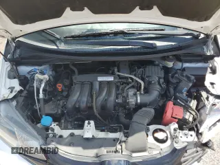 2015 Honda Fit LX z VIN 3HGGK5H59FM760585, wystawiony jako Copart lot #55737365 z przebiegiem 79 700 mil mil oraz Szkoda całkowita • Salvage title. Historia ofert i sprzedaży dostępna na DreamBid. Obrazek 11.