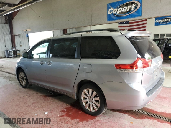 2011 Toyota Sienna XLE with VIN 5TDDK3DC7BS022837, listed as a Copart auction lot 60811445 with 210,732 mi miles and Salvage title. Bid and sale history available at DreamBid. Image 2.