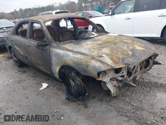 1999 Mazda 626 ES z VIN 1YVGF22C1X5840702, wystawiony jako IAAI lot #41047339 z przebiegiem Nie podano mil oraz . Historia ofert i sprzedaży dostępna na DreamBid. Obrazek 1.