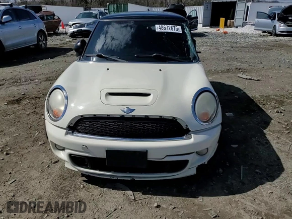 2011 MINI Hardtop S with VIN WMWSV3C59BTY23205, listed as a Copart auction lot 48672675 with 120,457 mi miles and Salvage Title. Bid and sale history available at DreamBid. Image 11.