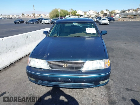 1998 Toyota Avalon XL with VIN 4T1BF18BXWU267131, listed as a IAAI auction lot 41518513 with 208,023 mi miles and . Bid and sale history available at DreamBid. Image 6.