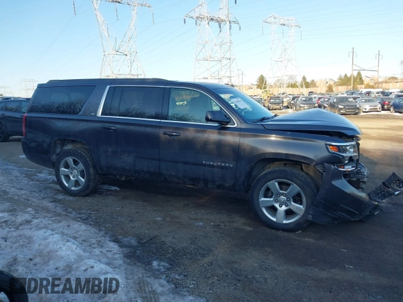 2016 Chevrolet Suburban LS with VIN 1GNSKGKC6GR412651, listed as a IAAI auction lot 41450964 with 114,833 mi miles. Bid and sale history available at carsss.com. Image 14.