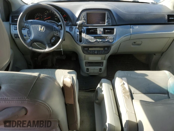 2007 Honda Odyssey Touring z VIN 5FNRL38887B062123, wystawiony jako Copart lot #52140755 z przebiegiem 240 710 mil mil oraz Szkoda całkowita • Salvage title. Historia ofert i sprzedaży dostępna na DreamBid. Obrazek 8.