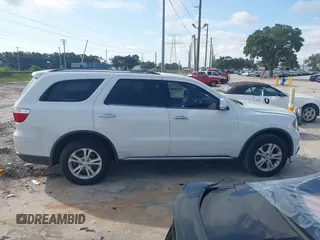2013 Dodge Durango Crew with VIN 1C4RDHDGXDC608209, listed as a IAAI auction lot 42779231 with 203,460 mi miles and . Bid and sale history available at DreamBid. Image 13.