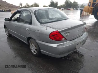 2003 Kia Spectra z VIN KNAFB121135297834, wystawiony jako IAAI lot #42409441 z przebiegiem 84 621 mil mil oraz . Historia ofert i sprzedaży dostępna na DreamBid. Obrazek 3.