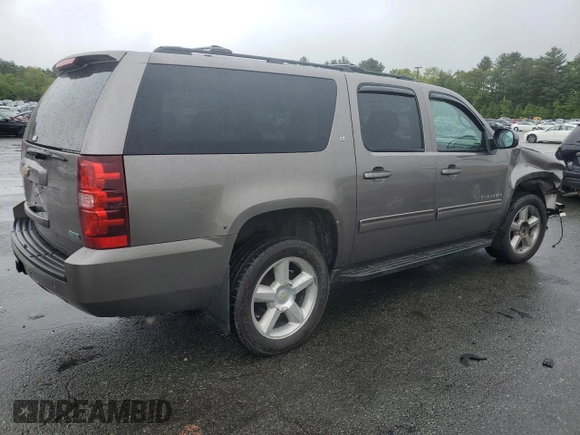 2011 Chevrolet Suburban LT z VIN 1GNSKJE39BR161772, wystawiony jako Copart lot #57075955 z przebiegiem Nie podano mil oraz Czysty tytuł • Clean title. Historia ofert i sprzedaży dostępna na DreamBid. Obrazek 3.