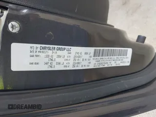 2015 Dodge Grand Caravan American Value with VIN 2C4RDGBG2FR542844, listed as a IAAI auction lot 42109983 with 129,718 mi miles and . Bid and sale history available at DreamBid. Image 9.