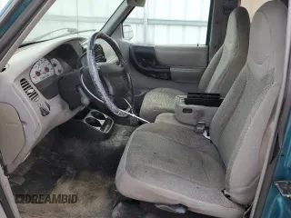 1997 Ford Ranger XLT with VIN 1FTCR14X0VPB40063, listed as a Copart auction lot 84930094 with 121,186 mi miles and Salvage Title. Bid and sale history available at DreamBid. Image 7.