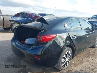 2015 Mazda 3 i SV with VIN JM1BM1T76F1262569, listed as a IAAI auction lot 41472375 with 89,932 mi miles. Bid and sale history available at carsss.com. Image 17.