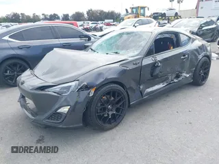 2013 Scion FR-S with VIN JF1ZNAA16D2713197, listed as a IAAI auction lot 42047792 with 83,430 mi miles. Bid and sale history available at carsss.com. Image 2.