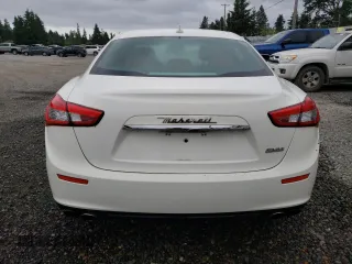 2014 Maserati Ghibli z VIN ZAM57XSA3E1101014, wystawiony jako Copart lot #59591765 z przebiegiem 91 892 mil mil oraz Czysty tytuł • Clean title. Historia ofert i sprzedaży dostępna na DreamBid. Obrazek 6.