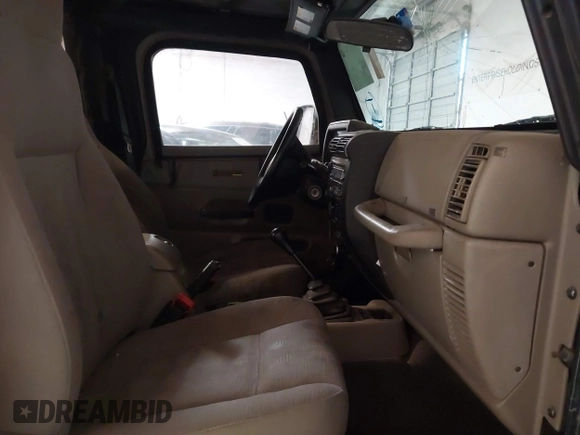 2003 Jeep Wrangler X z VIN 1J4FA39S43P339234, wystawiony jako IAAI lot #41329654 z przebiegiem 175 376 mil mil oraz . Historia ofert i sprzedaży dostępna na DreamBid. Obrazek 5.