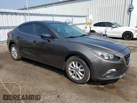2014 Mazda 3 i Touring with VIN JM1BM1V79E1151770, listed as a Copart auction lot 60100155 with 274,752 mi miles and Salvage title. Bid and sale history available at DreamBid. Image 4.
