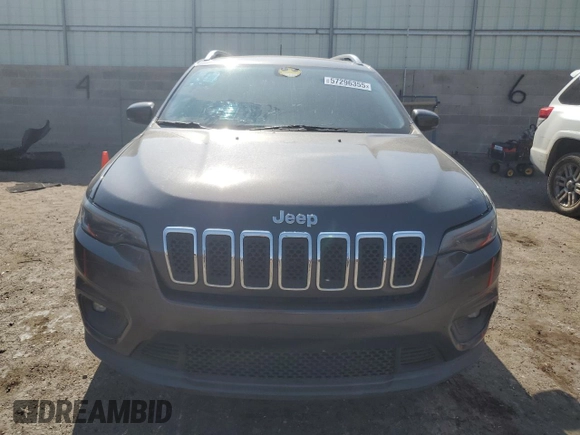 2019 Jeep Cherokee Latitude Plus with VIN 1C4PJLLX4KD248561, listed as a Copart auction lot 57296355 with 123,308 mi miles and Salvage title. Bid and sale history available at DreamBid. Image 5.