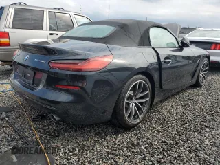 2022 BMW Z4 sDrive30i with VIN WBAHF3C04NWX42062, listed as a Copart auction lot 74989854 with 0 mi miles and Salvage Title. Bid and sale history available at carsss.com. Image 3.