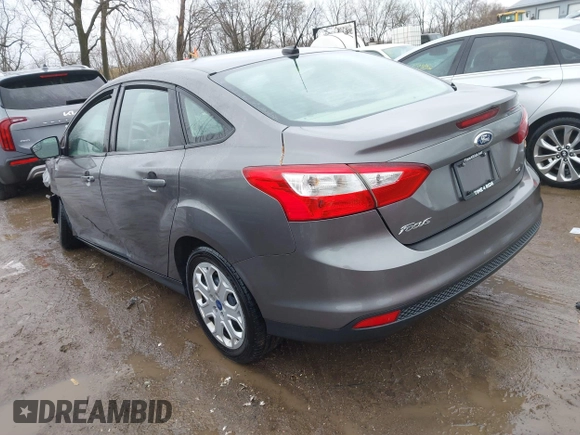 2012 Ford Focus SE with VIN 1FAHP3F26CL220986, listed as a IAAI auction lot 41719127 with 127,050 mi miles and . Bid and sale history available at DreamBid. Image 3.