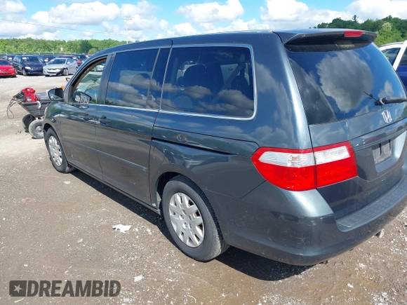 2005 Honda Odyssey LX with VIN 5FNRL38205B128740, listed as a IAAI auction lot 42209974 with 183,014 mi miles and . Bid and sale history available at DreamBid. Image 3.