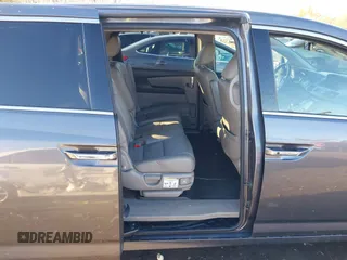 2014 Honda Odyssey Touring with VIN 5FNRL5H94EB081267, listed as a IAAI auction lot 41199509 with 146,827 mi miles and . Bid and sale history available at DreamBid. Image 8.