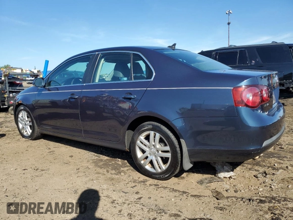 2009 Volkswagen Jetta with VIN 3VWAL71KX9M055857, listed as a Copart auction lot 66105295 with 281,546 mi miles and Clean title. Bid and sale history available at DreamBid. Image 2.