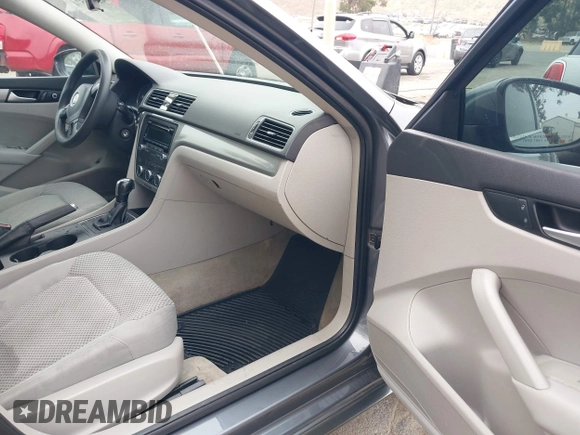 2012 Volkswagen Passat S with VIN 1VWAH7A31CC087907, listed as a IAAI auction lot 42083574 with 185,591 mi miles and . Bid and sale history available at DreamBid. Image 5.