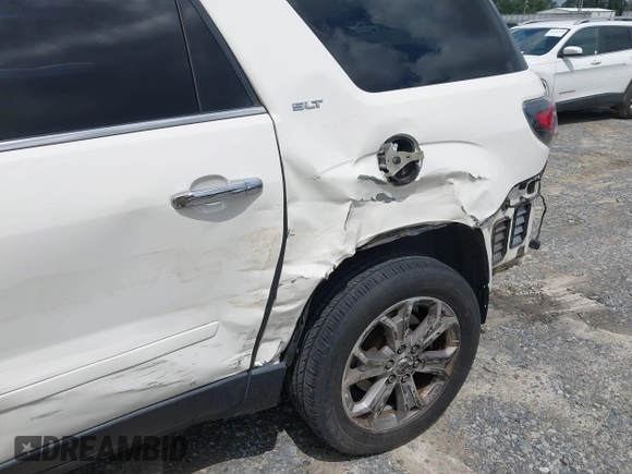 2015 GMC Acadia SLT with VIN 1GKKRSKDXFJ171596, listed as a IAAI auction lot 42615838 with 92,799 mi miles and . Bid and sale history available at DreamBid. Image 6.