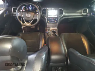 2017 Jeep Grand Cherokee Altitude with VIN 1C4RJFAG9HC772705, listed as a Copart auction lot 61562925 with 184,004 mi miles and Salvage title. Bid and sale history available at DreamBid. Image 8.