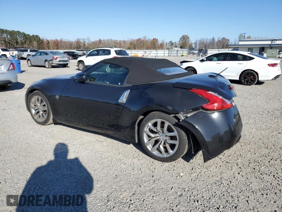 2014 Nissan 370Z Touring with VIN JN1AZ4FH3EM620195, listed as a Copart auction lot 83207104 with 66,974 mi miles and Salvage Title. Bid and sale history available at DreamBid. Image 2.