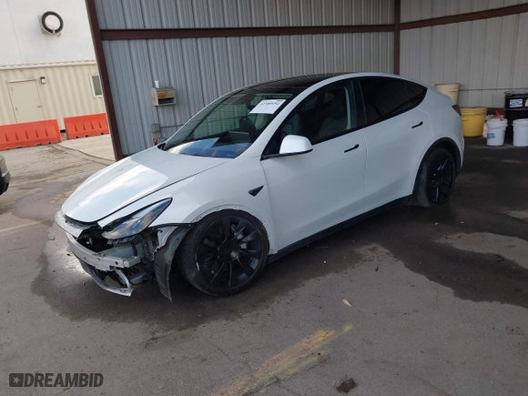 2023 Tesla Model Y Long Range with VIN 7SAYGAEE0PF787216, listed as a IAAI auction lot 41589954 with 17,985 mi miles. Bid and sale history available at carsss.com. Image 20.