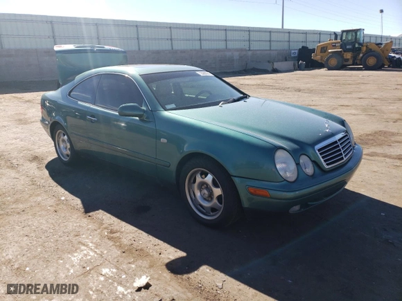 1999 Mercedes-Benz CLK-Class with VIN WDBLJ65G4XF071095, listed as a Copart auction lot 72080064 with 97,558 mi miles and Salvage Title. Bid and sale history available at carsss.com. Image 4.